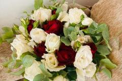 White and red rose bouquet arrangement for wedding or romantic occasion